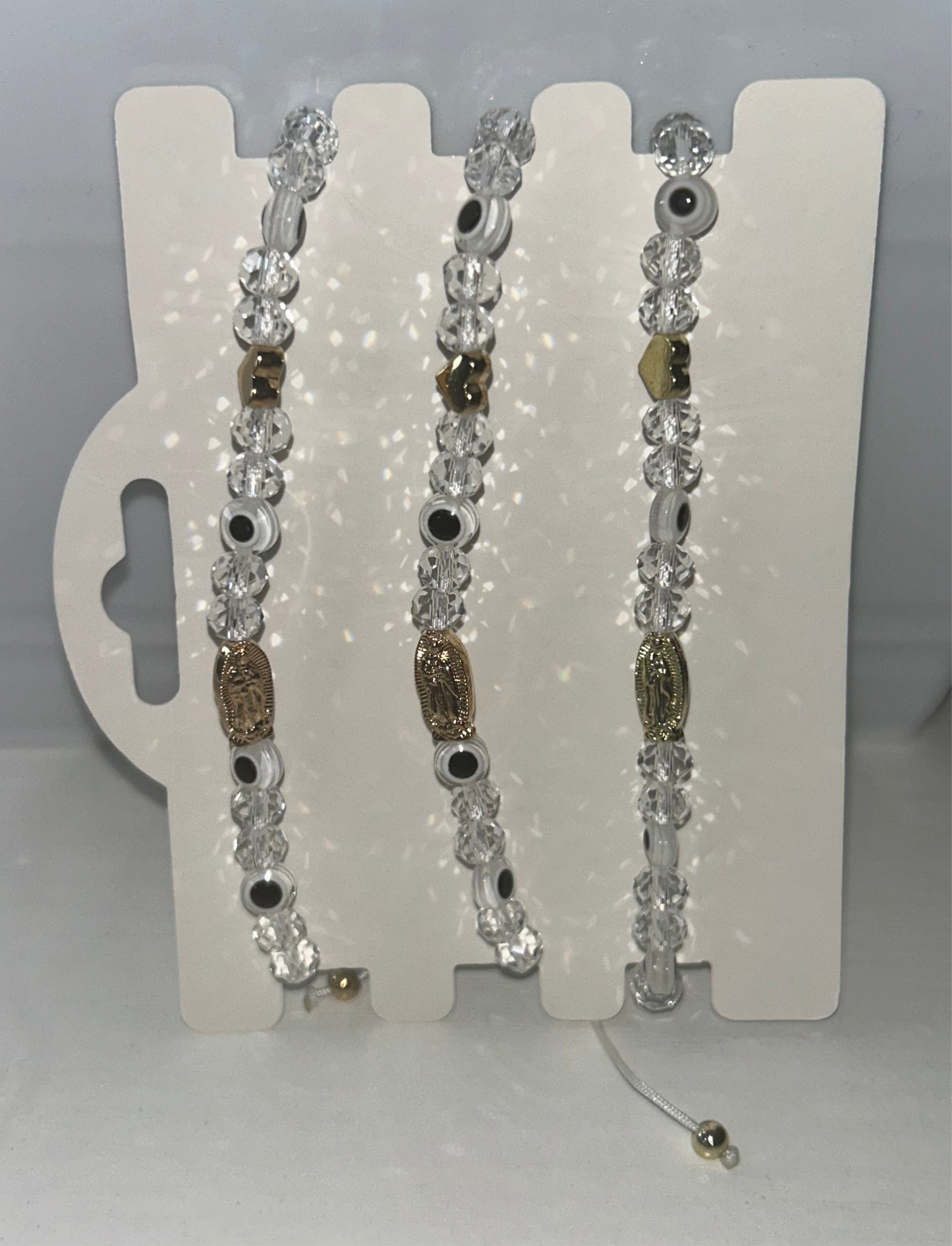 White beaded Virgencita bracelet