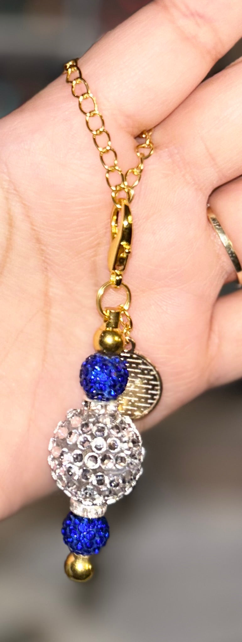 Evil eye gold cup charm