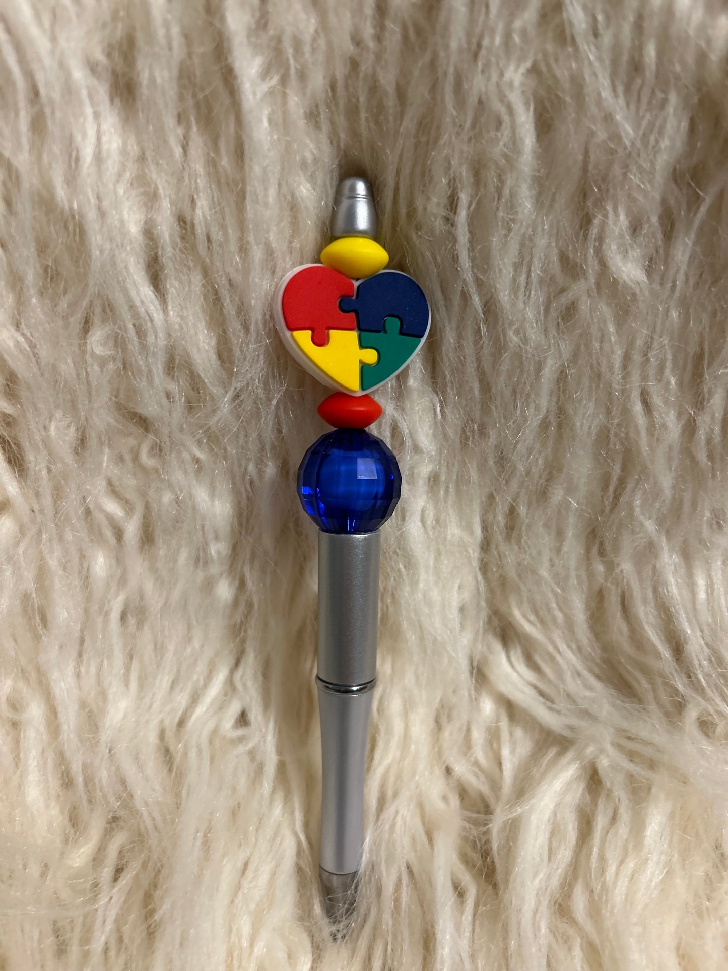Heart puzzle pen