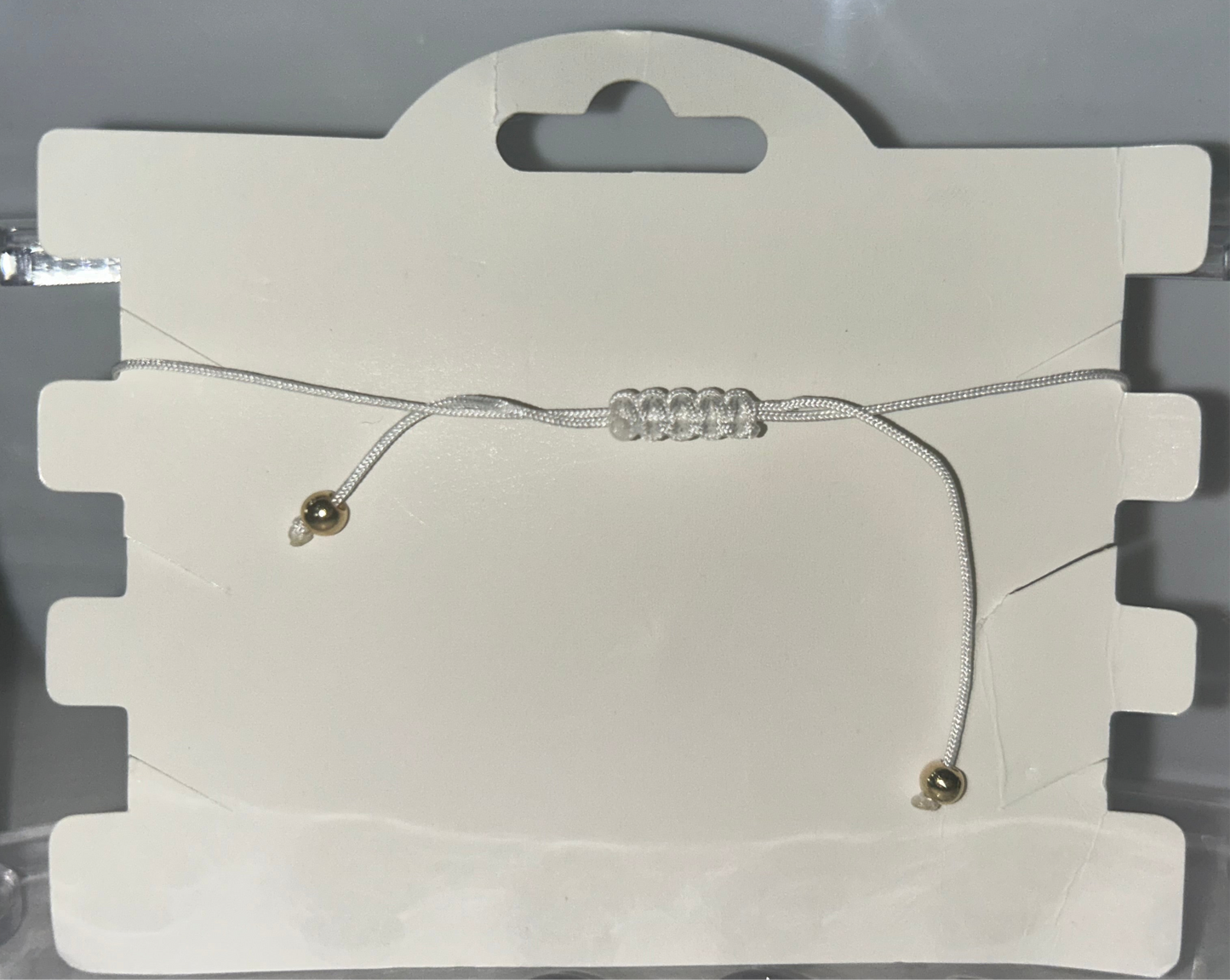 White rhinestone cross bracelet