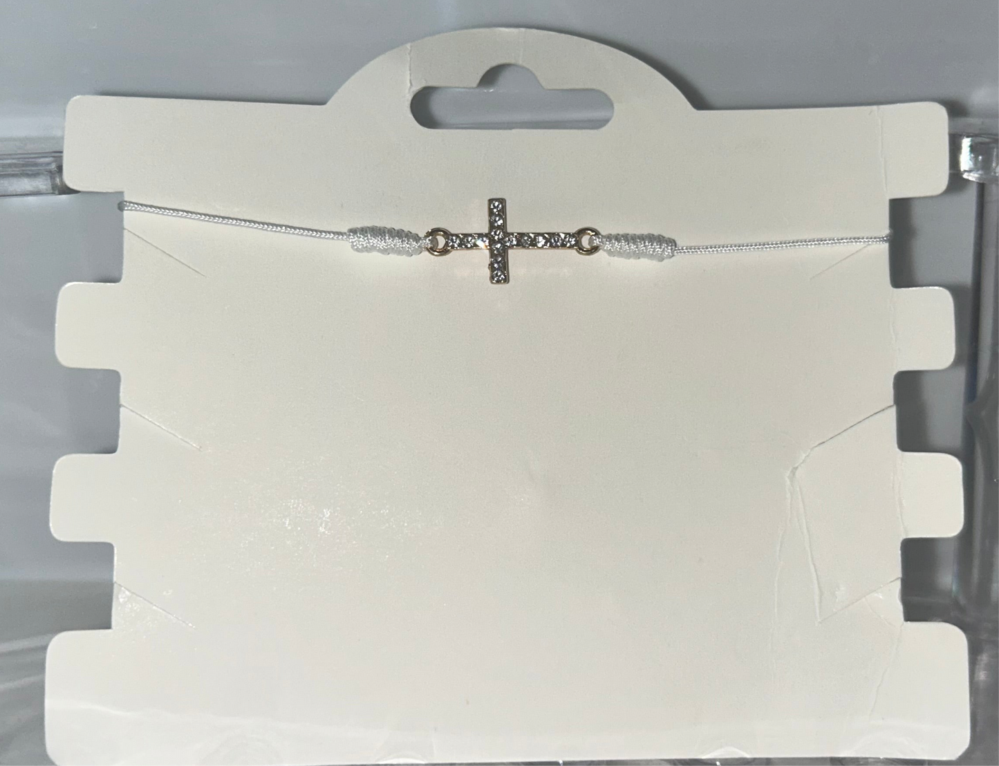 White rhinestone cross bracelet