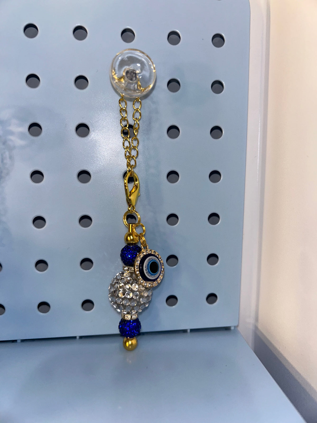 Evil eye gold cup charm