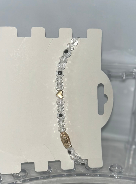 White beaded Virgencita bracelet