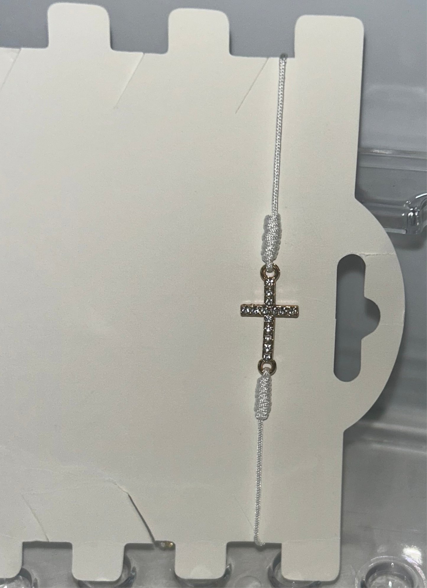 White rhinestone cross bracelet