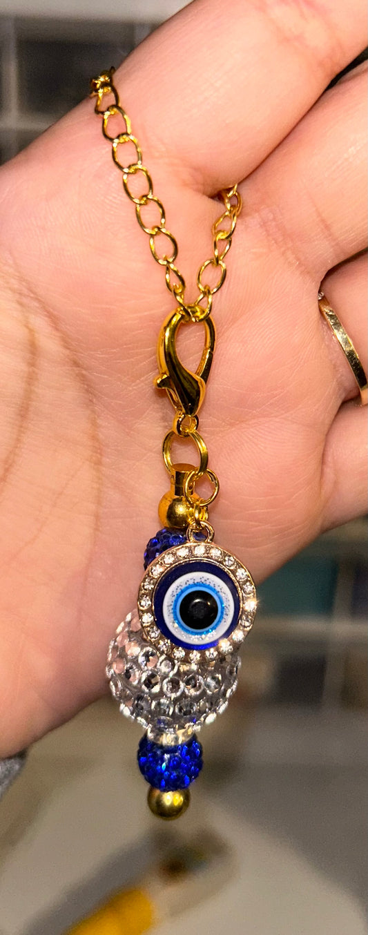 Evil eye gold cup charm