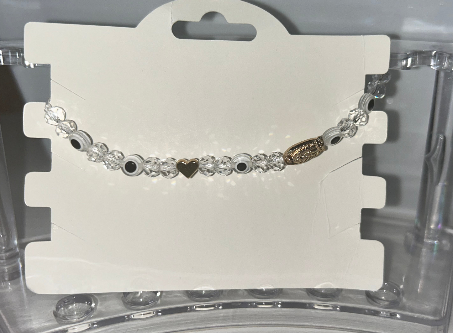 White beaded Virgencita bracelet