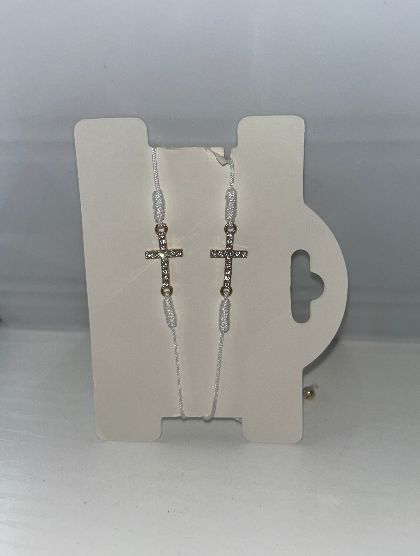 White rhinestone cross bracelet
