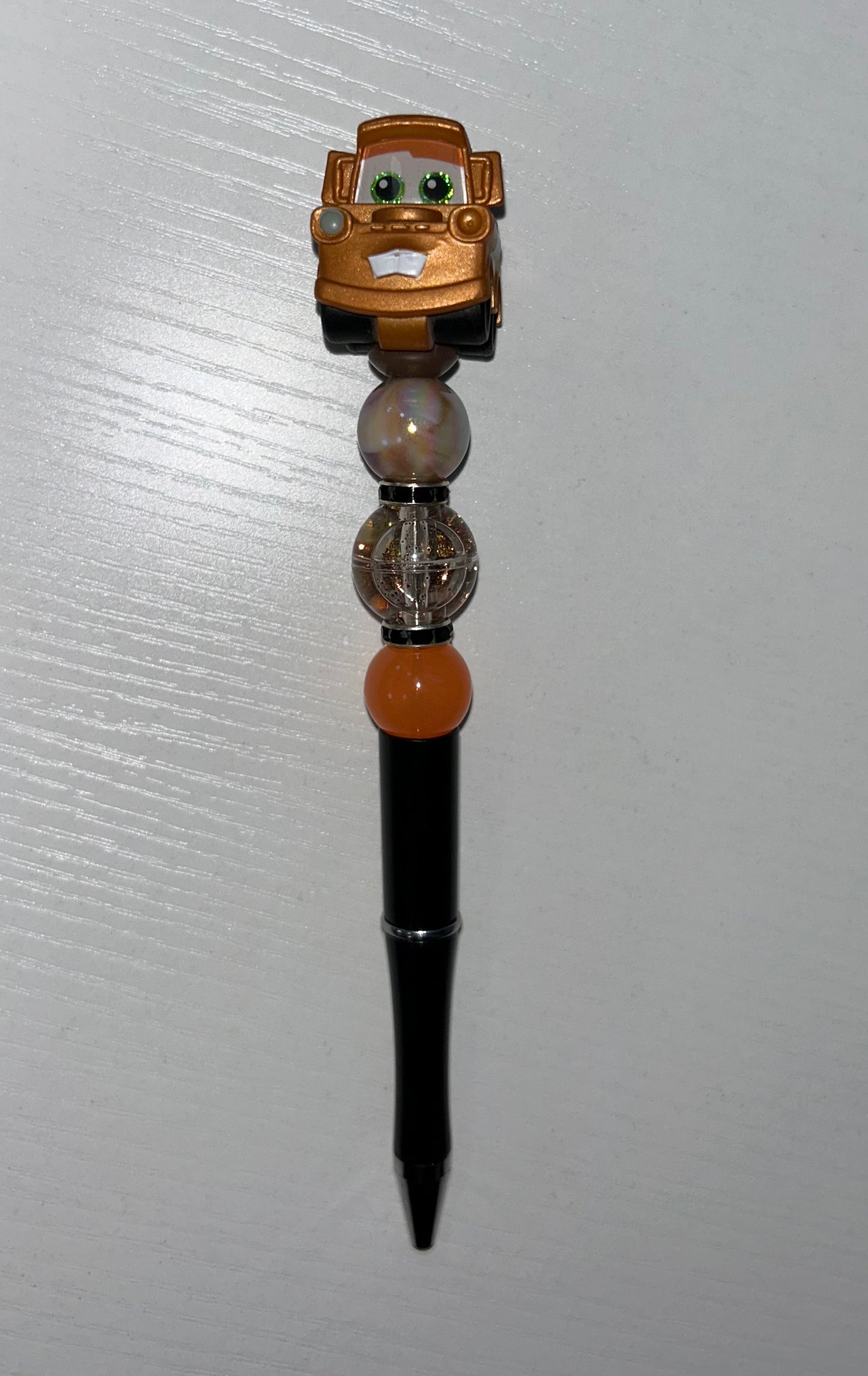 Brown tow truck pen