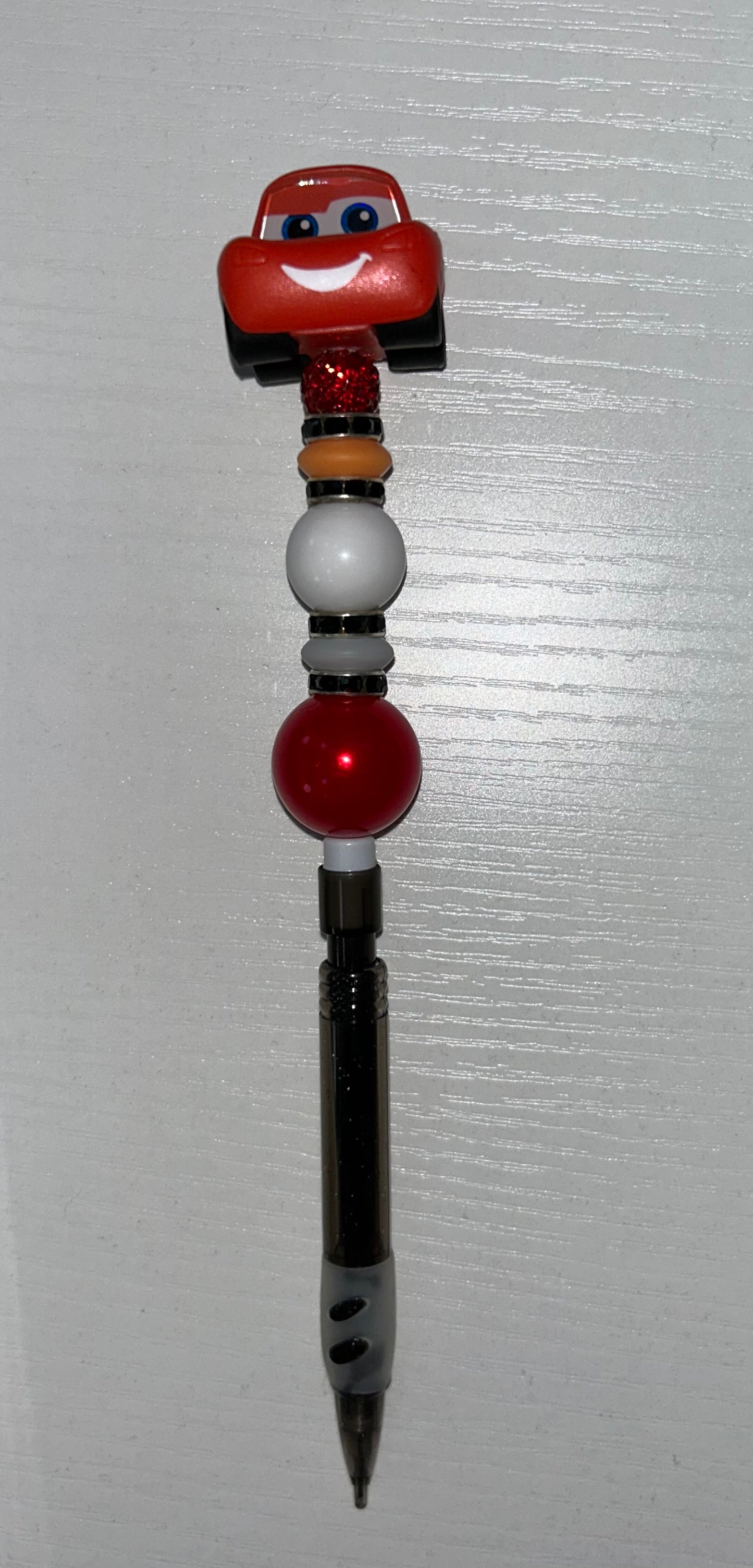 Red race car pencil