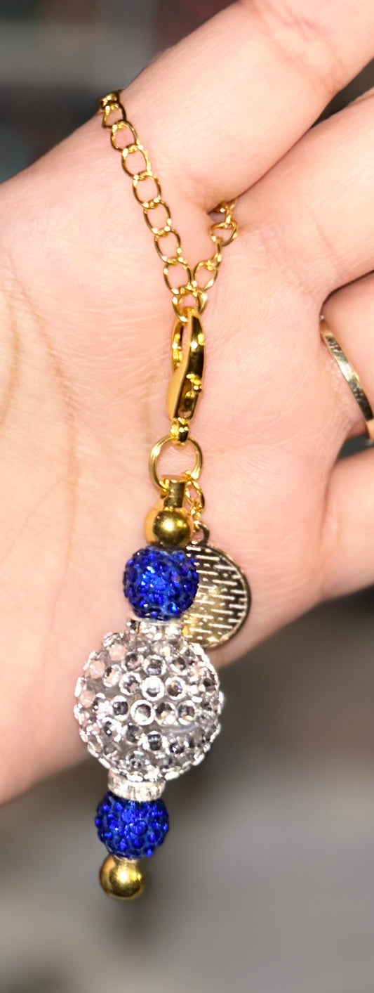 Evil eye gold cup charm