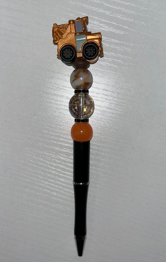 Brown tow truck pen