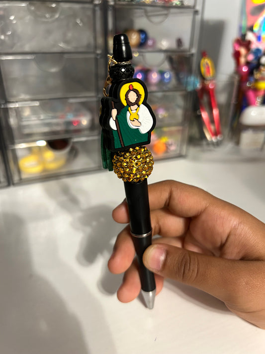 Black and gold San Judas pen