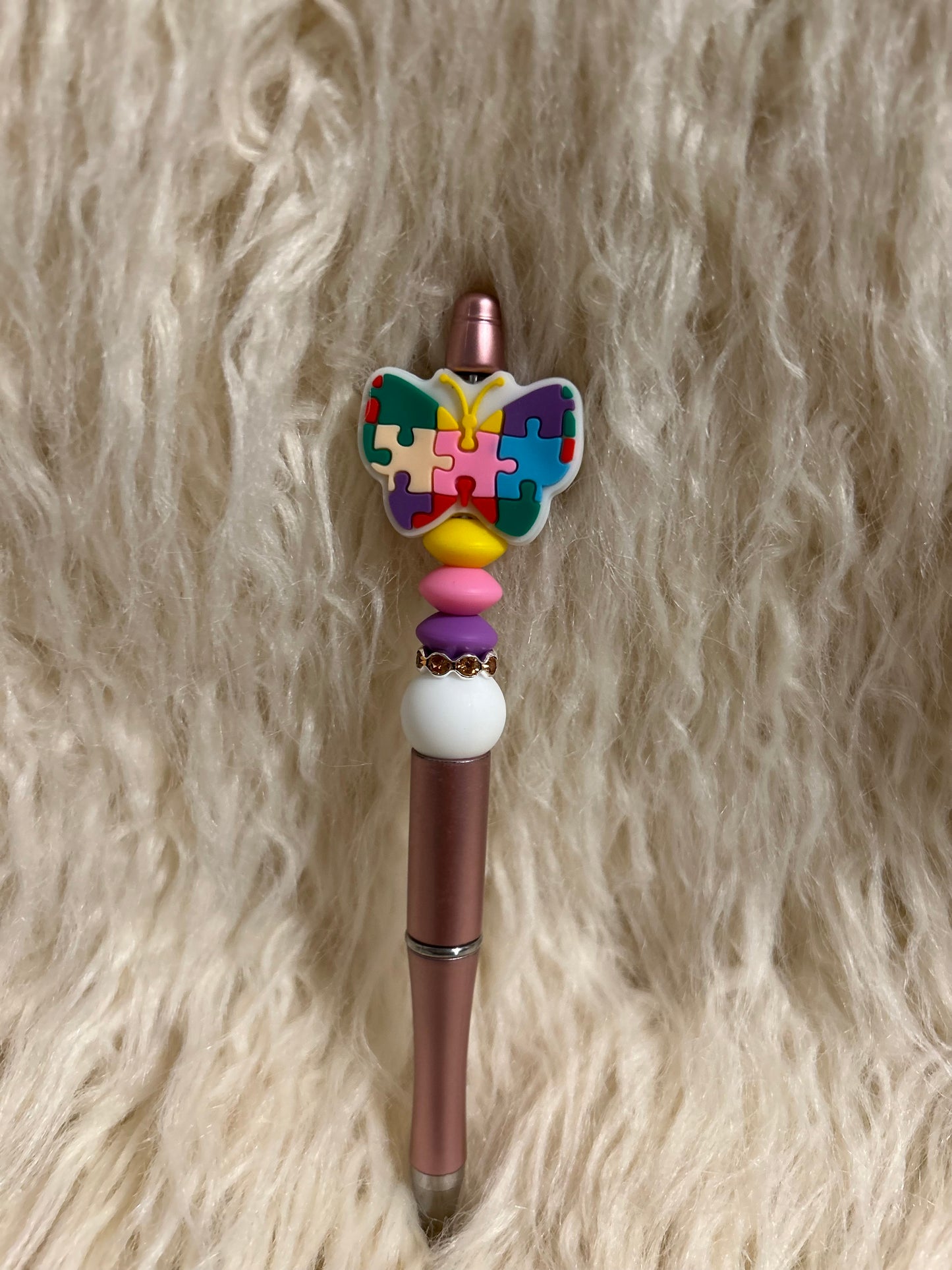 Butterfly puzzle pen